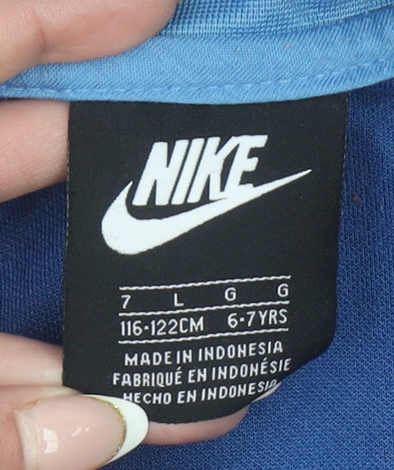 Brand and care label for Nike boys’ blue 1/4 zip colourblock sweatshirt 6-7 years
