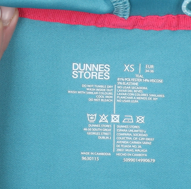 Brand and care label for Dunnes women’s teal xs full zip hoodie polyester blend