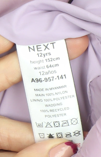 Brand and care label for Next girls’ purple hooded puffer jacket 12 years lightweight quilted coat