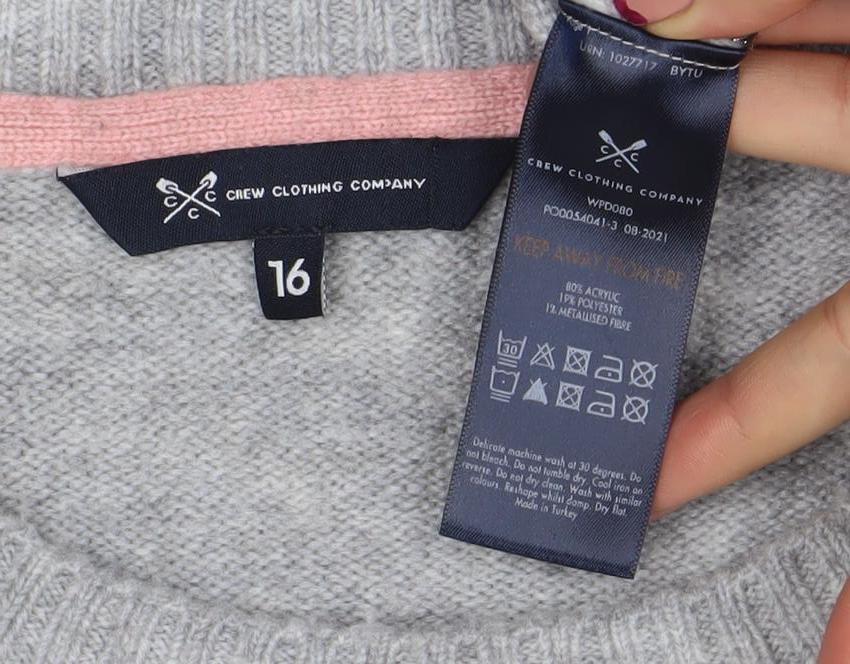 Brand and care label for Crew Clothing girls’ grey bow stripe knit jumper, size 16, years