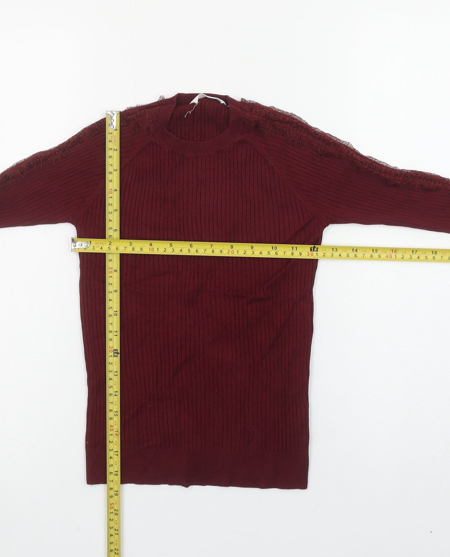 Brand and care label for Matalan girls’ red ribbed lace long sleeve pullover top 12 years