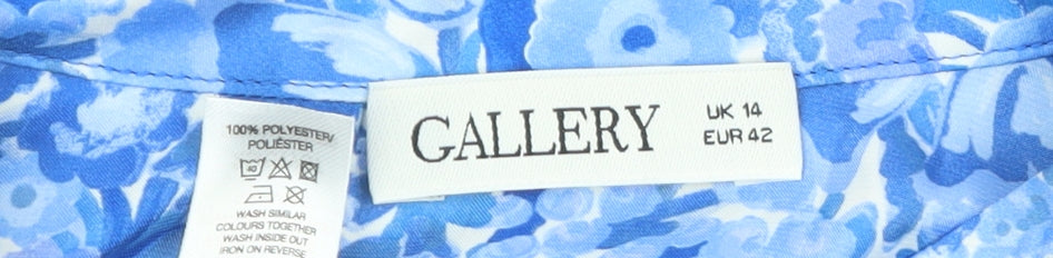 Brand and care label for Gallery Women's Blue Floral Long Sleeve Polyester Blouse, size 14