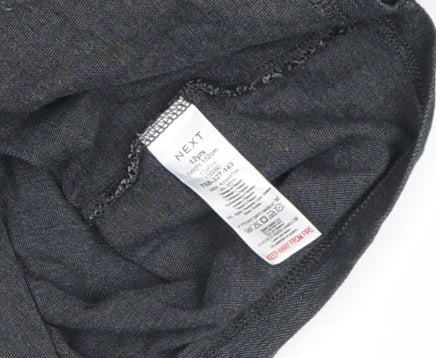 Brand and care label for Next girls’ black long sleeve polo shirt, size 14, years cotton blend