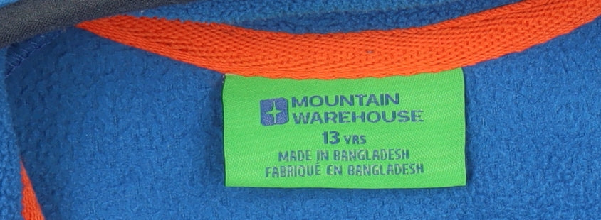 Brand and care label for Mountain Warehouse boys’ blue fleece full zip jacket, size 13, years