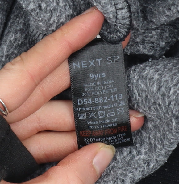 Brand and care label for Next boys’ black crew neck pullover sweatshirt 9 years cotton blend logo