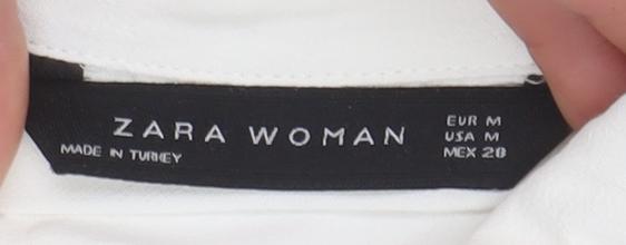 Brand and care label for Zara Woman White Collared Ruffle Sleeve Tie Waist Blouse, size 12