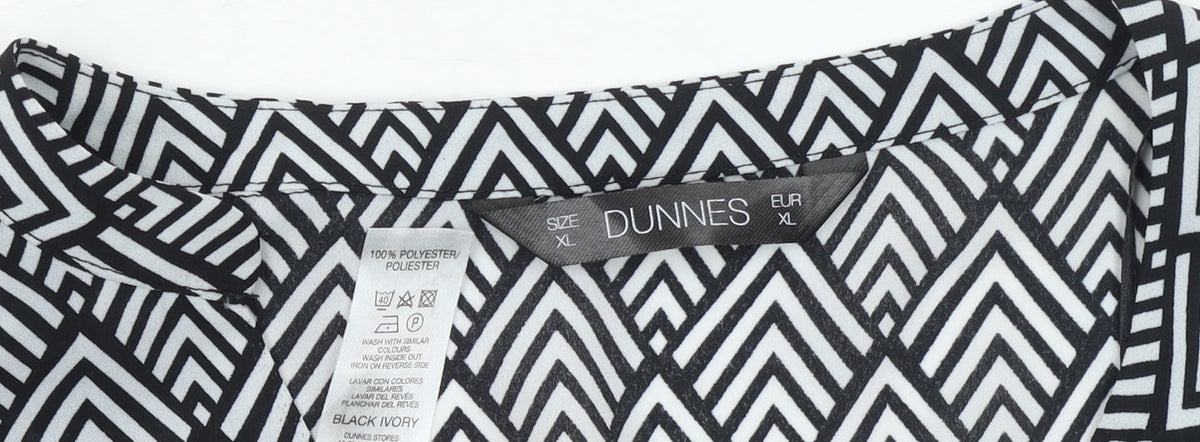 Brand and care label for Dunnes Women’s Black Ivory Geometric Long Sleeve Blouse XL