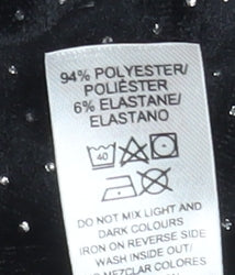 Additional view of Leigh Tucker Willow girls’ black velvet polka dot leggings 7-8 years