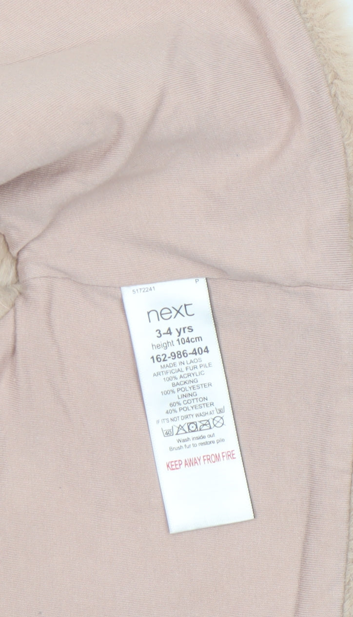 Brand and care label for Next girls’ beige faux fur lined waistcoat 3-4 years soft winter gilet