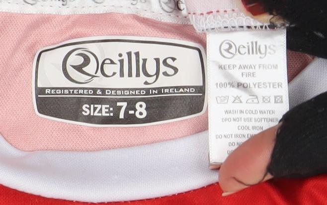 Brand and care label for O'Reillys boys’ red 7-8 years football jersey t-shirt