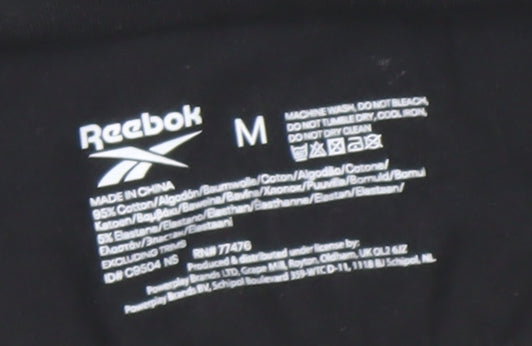 Brand and care label for Reebok girls’ black m sports crop tank top gym training activewear