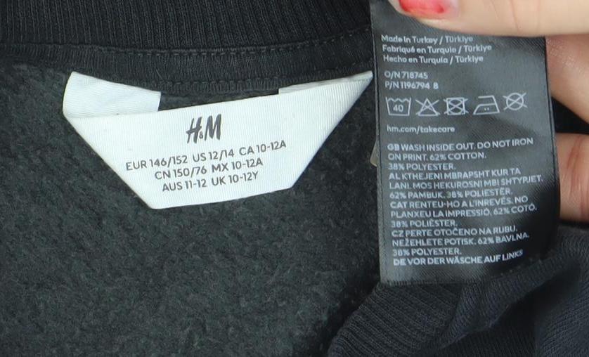 Brand and care label for H&M girls’ black lilo & stitch graphic pullover sweatshirt 10-12 years