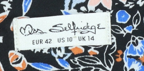 Brand and care label for Miss Selfridge women’s multicoloured floral culotte shorts, size UK 14