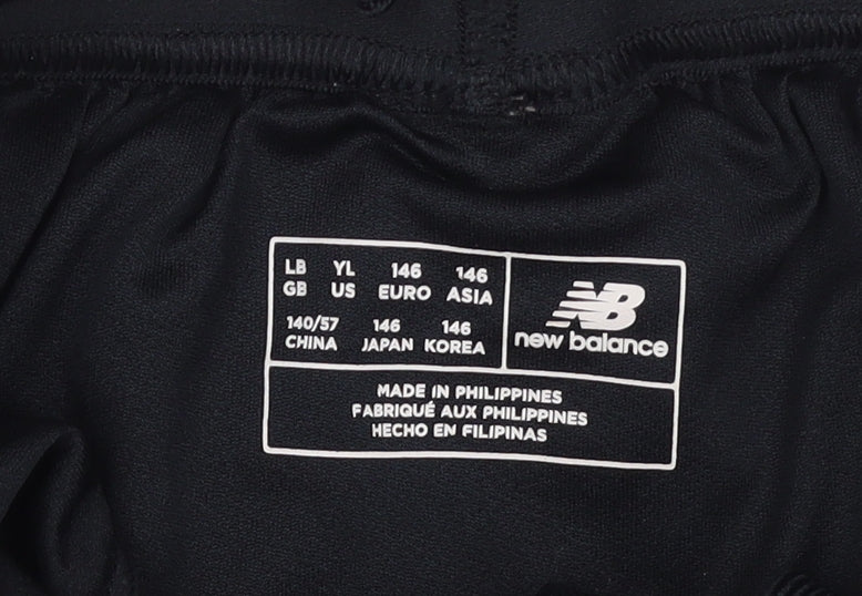 Brand and care label for New Balance boys’ black lfc 125 years athletic football shorts 11 years