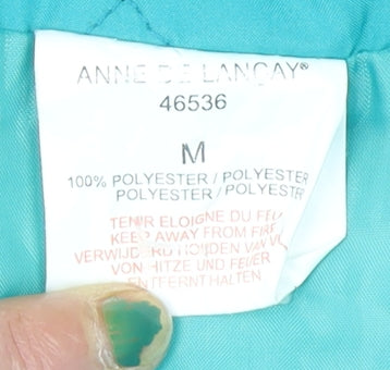 Brand and care label for Anne de Lançay Women's Blue Quilted Waistcoat, size M