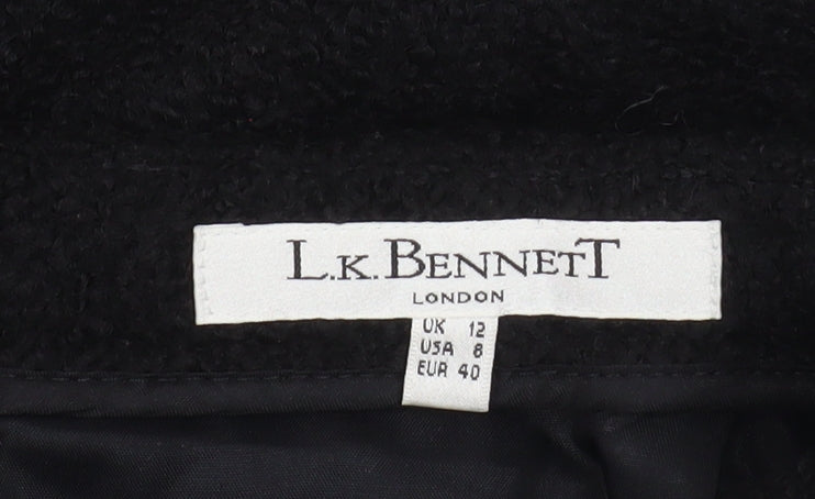 Brand and care label for L.K. Bennett Women's Black Wool Pencil Skirt, size 12