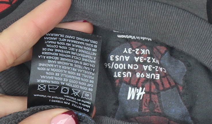 Brand and care label for H&M boys’ grey spider-man short sleeve outfit set 2-3 years 100% cotton