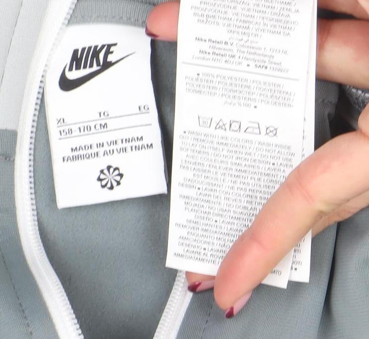 Brand and care label for Nike boys’ grey full zip hoodie jacket xl 158-170cm polyester blend