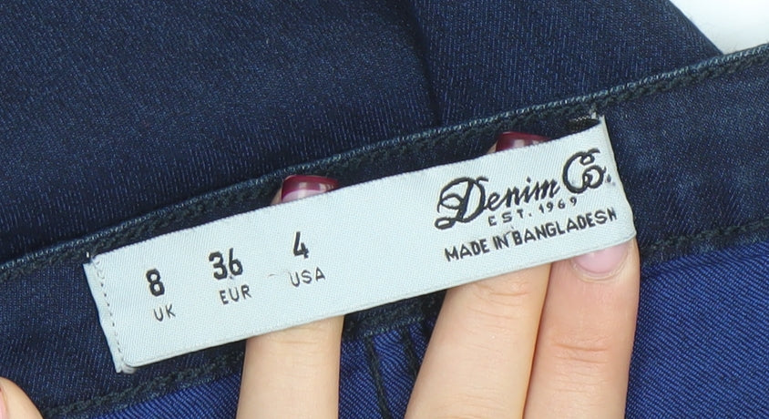 Brand and care label for Denim Co. women’s blue skinny stretch jeans, size UK 8