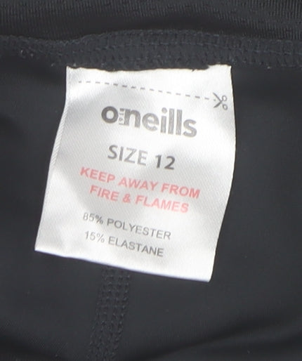 Brand and care label for O'Neill women’s black, size UK 12, leggings slim fit activewear trousers