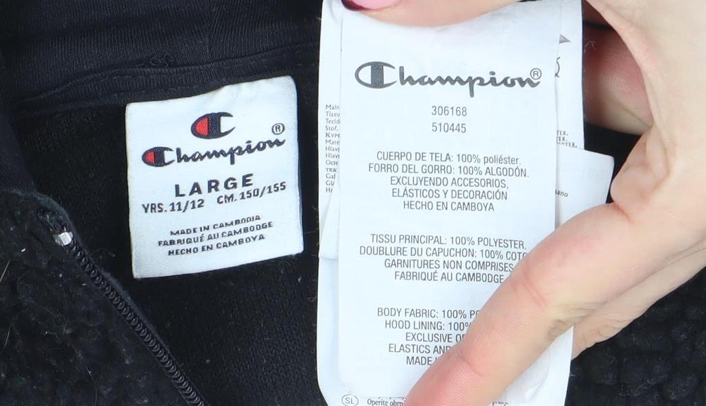 Brand and care label for Champion girls’ black fleece 1/4 zip pullover hoodie, size L