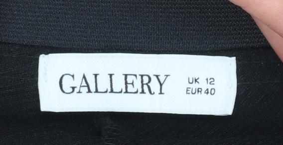 Brand and care label for Gallery women’s black, size UK 12, straight leg trousers with stretch