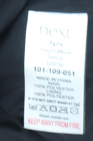 Brand and care label for Next girls’ black faux fur fleece coat, size 3, years button up winter jacket