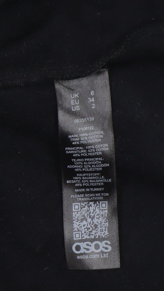 Brand and care label for ASOS women’s black contrast sleeve tunic blouse, size UK 6