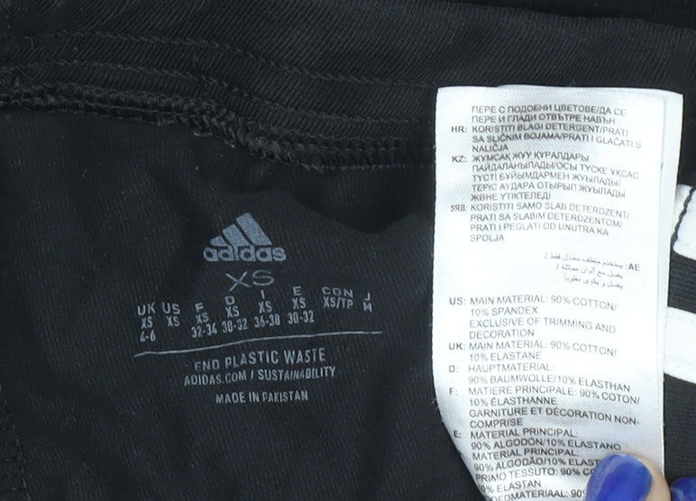Brand and care label for Adidas women’s black xs leggings jogger style cotton blend