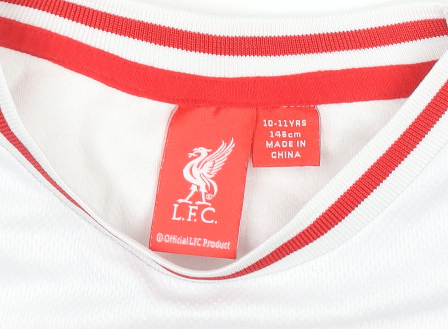 Brand and care label for L.F.C. boys’ white 10-11 years short sleeve polyester football t-shirt