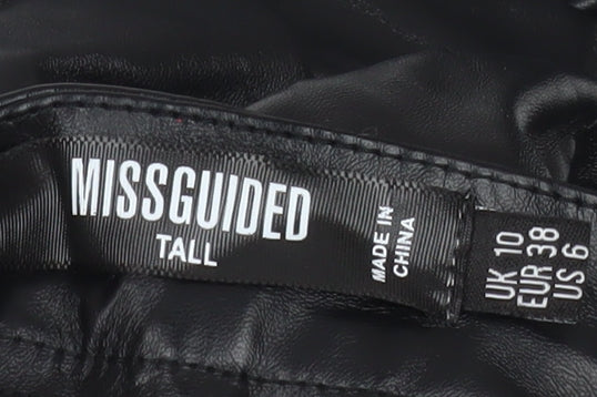 Brand and care label for Missguided Tall Black Faux Leather High Rise Skinny Trousers, size 10