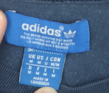 Brand and care label for Adidas Men's Blue Crew Neck Short Sleeve T-Shirt, size M