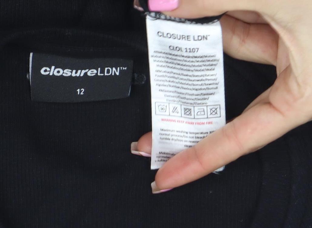 Brand and care label for Closure LDN Women's Black, size 12, Button-Up Long Sleeve Top