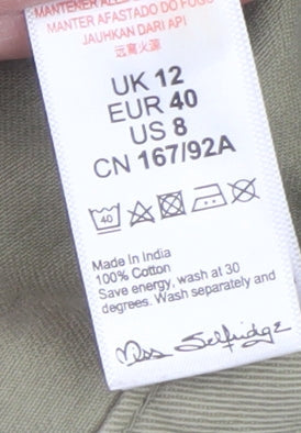 Brand and care label for Miss Selfridge Women’s Green Cotton Basic Jacket UK 12