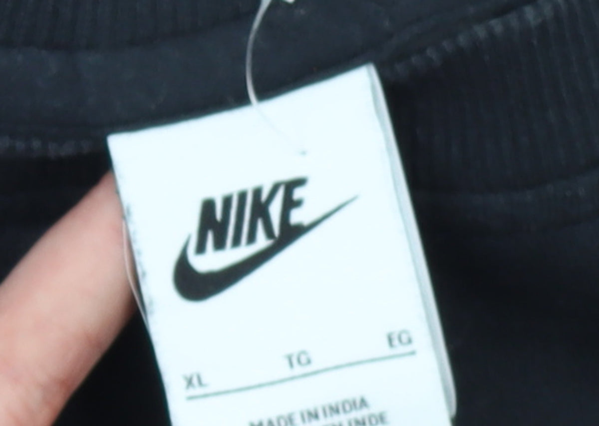 Brand and care label for Nike boys’ black xl pullover sweatshirt with neon logo – regular fit