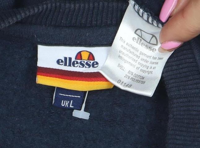 Brand and care label for Ellesse Women's Navy Blue Crew Neck Pullover Sweatshirt UK L