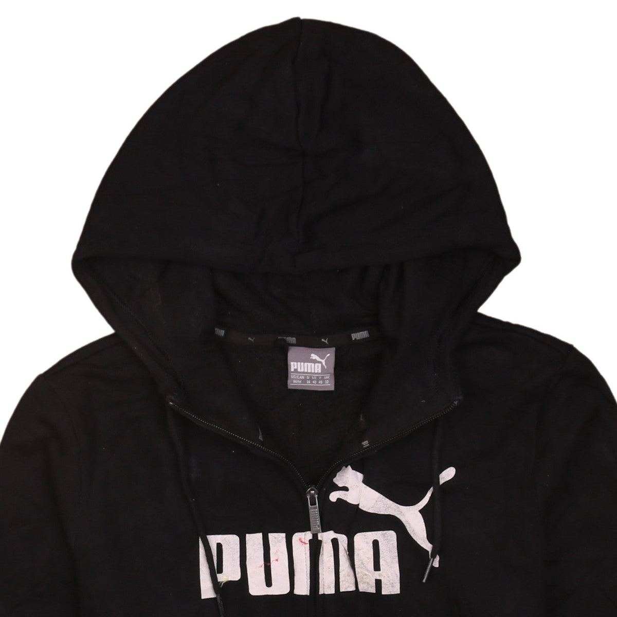Brand and care label for Puma women’s black full zip hoodie, size UK 12, logo print casual sweatshirt
