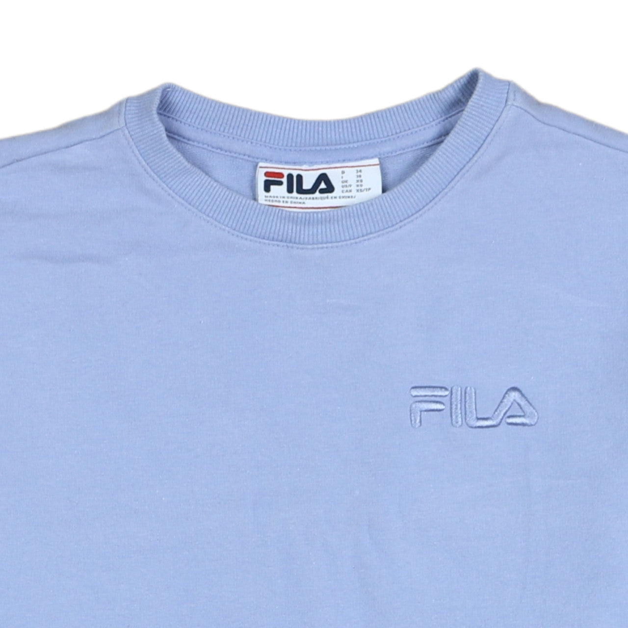 Brand and care label for Fila Women's Light Blue Crew Neck Pullover Sweatshirt XS