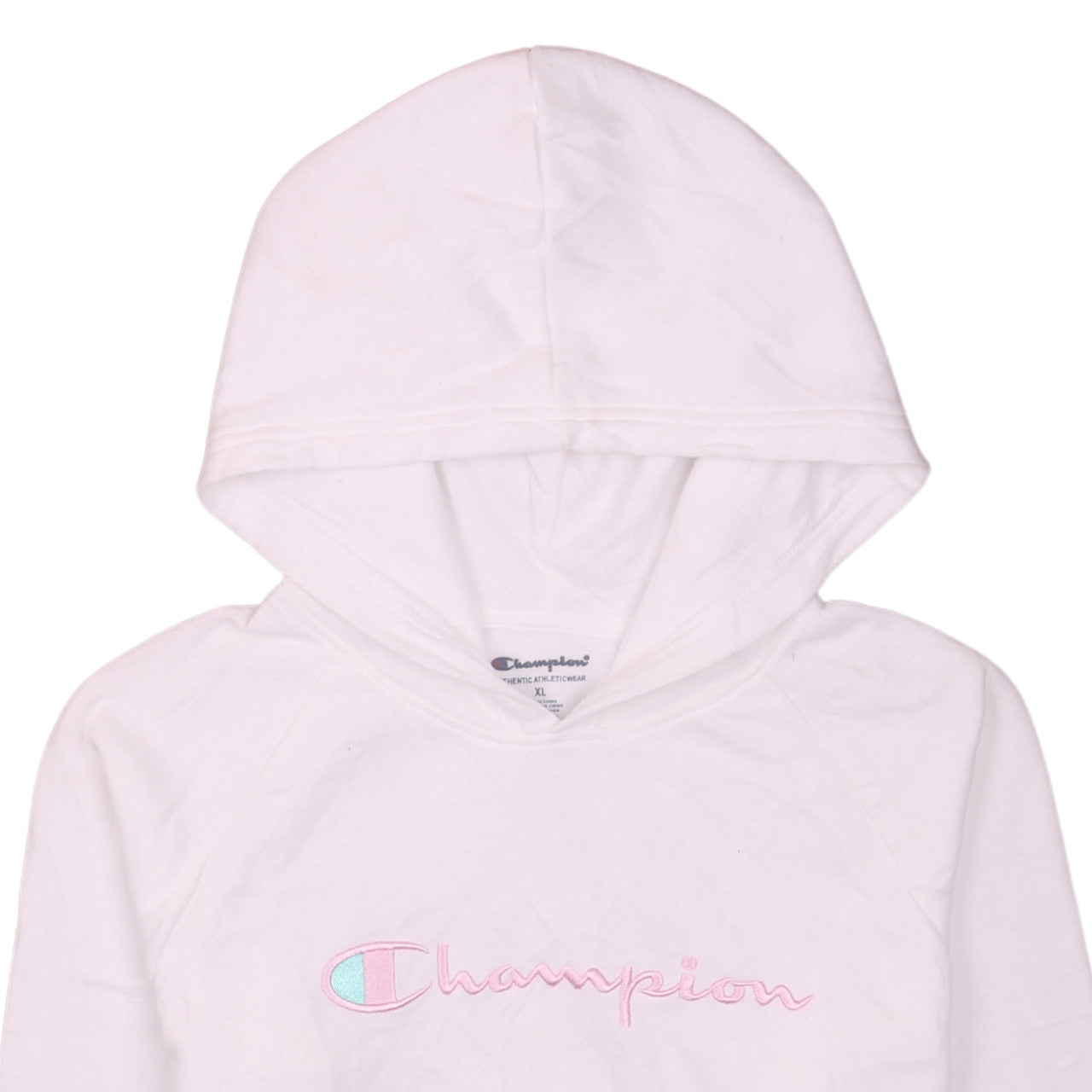 Brand and care label for Champion girls’ white xl pullover hoodie with embroidered logo