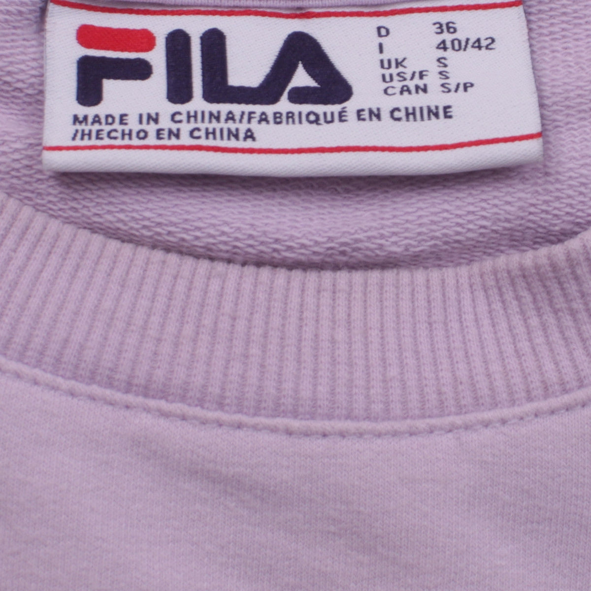 Brand and care label for Fila Women's Pink Crew Neck Pullover Sweatshirt, size S