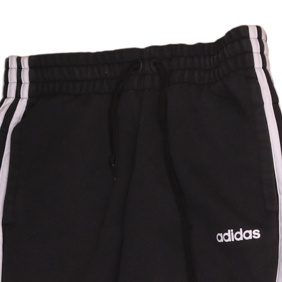 Brand and care label for Adidas women’s black xs jogger trousers elastic waist comfort fit