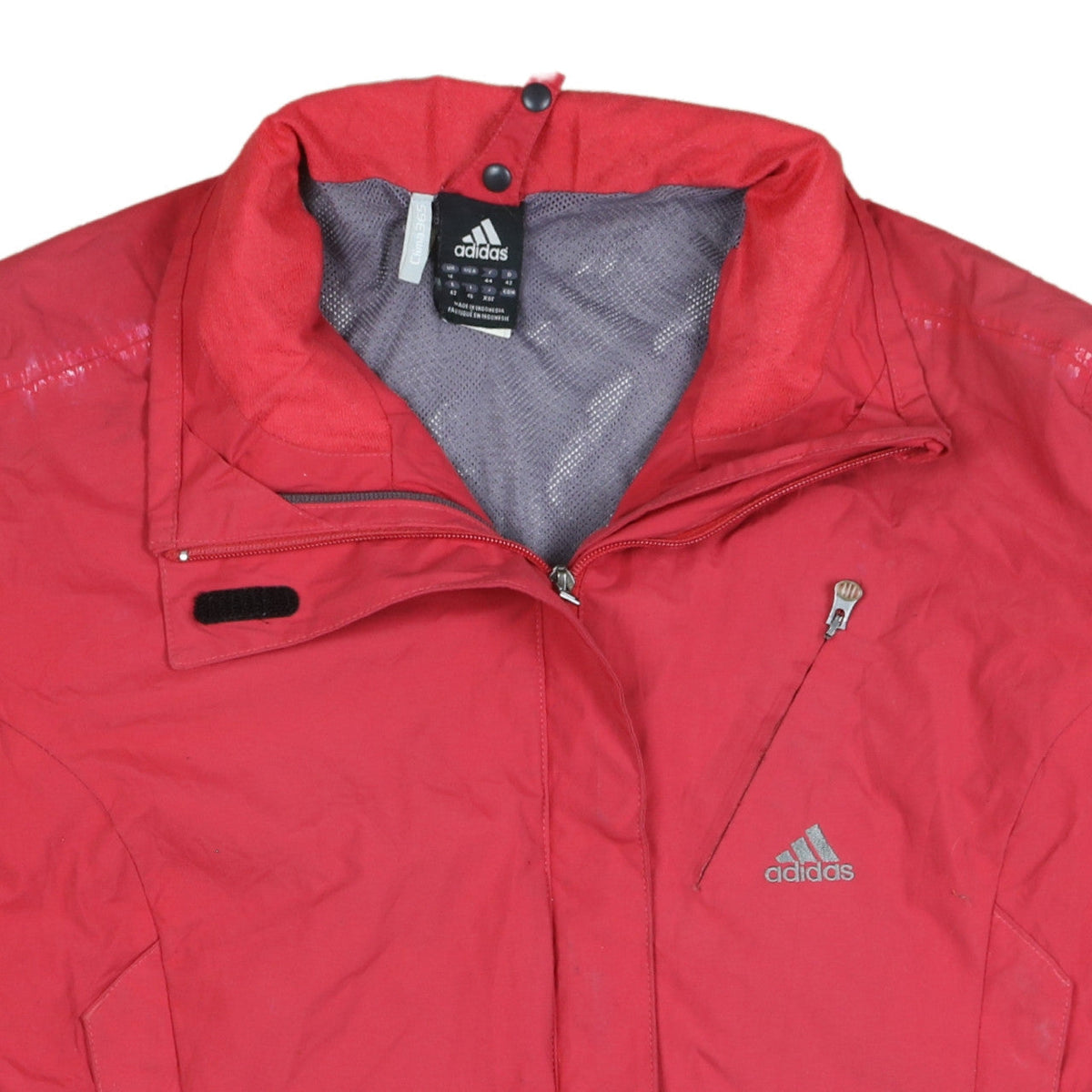Brand and care label for Adidas Women's Red Windbreaker Jacket, size 16, Reflective Sport Style