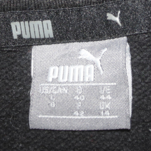 Close-up detail of Puma girls’ black pullover hoodie l 14 years cotton blend casual
