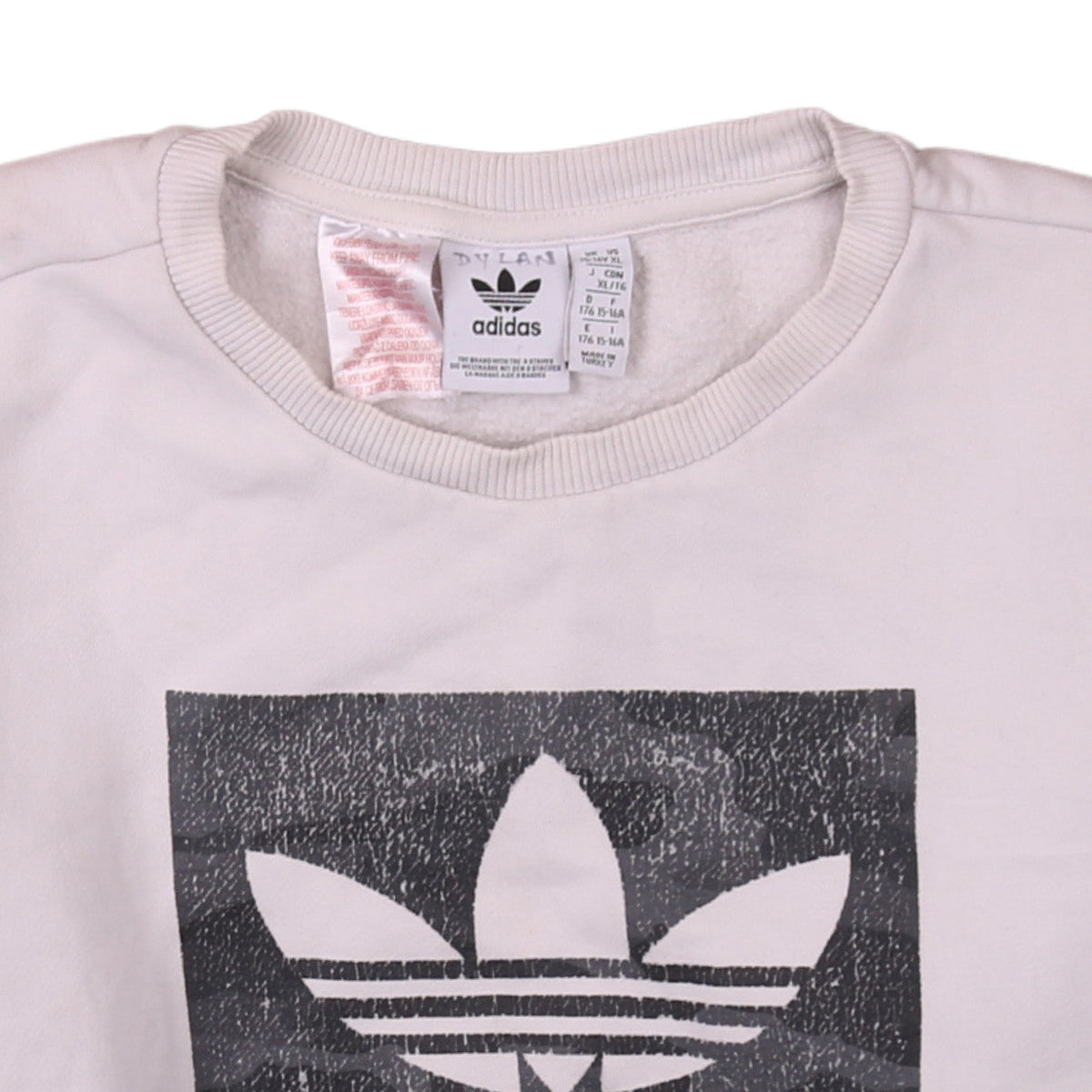 Brand and care label for Adidas boys’ white xl sweatshirt with trefoil logo and crew neck