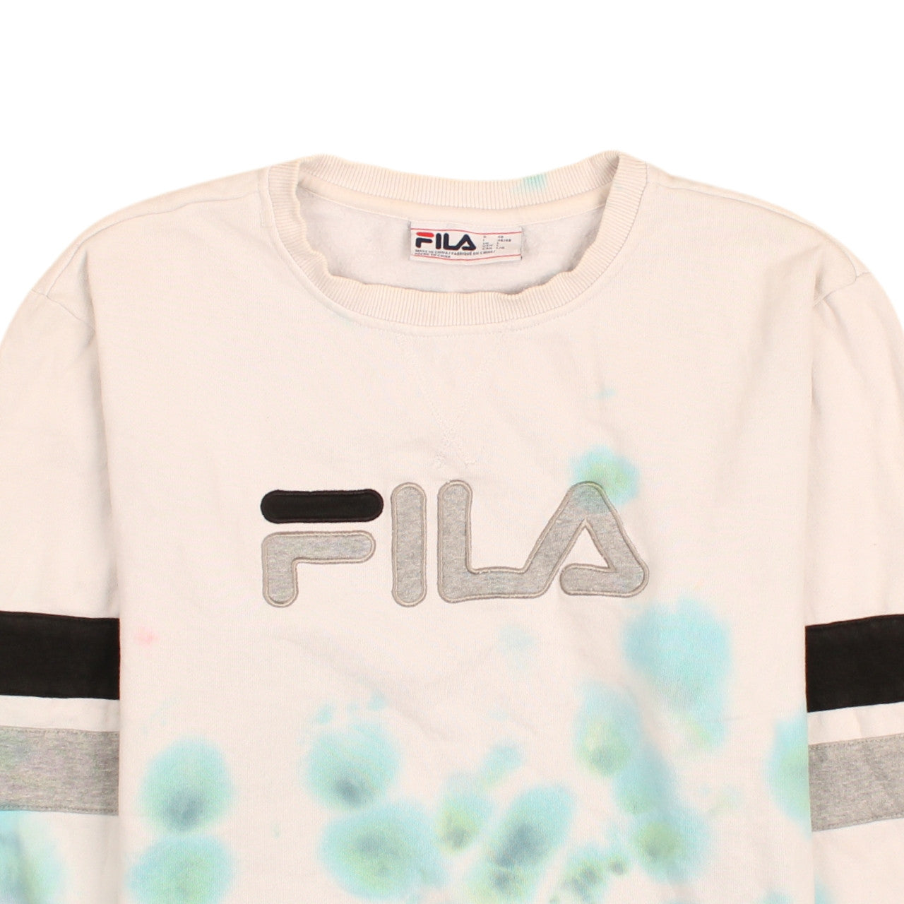 Brand and care label for Fila women’s cream blue tie-dye logo sweatshirt, size L