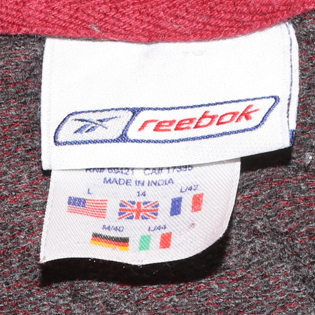 Close-up detail of Reebok boys’ red & grey crew neck pullover sweatshirt l