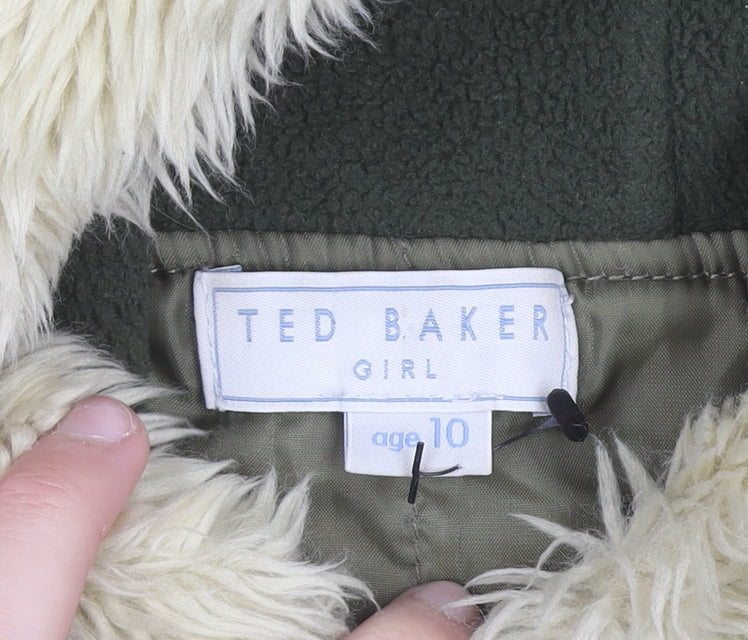 Brand and care label for Ted Baker girls’ green hooded fur trim bomber jacket age 10 winter coat