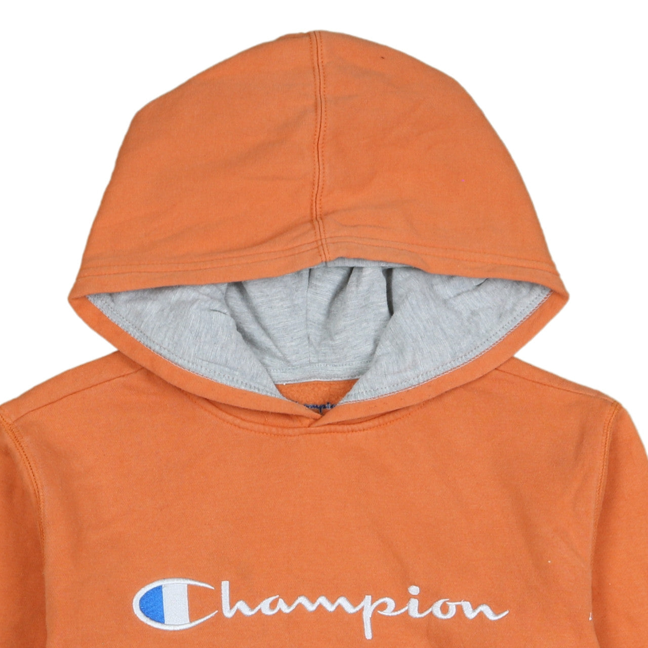 Brand and care label for Champion boys’ orange pullover hoodie large cotton blend logo sweatshirt