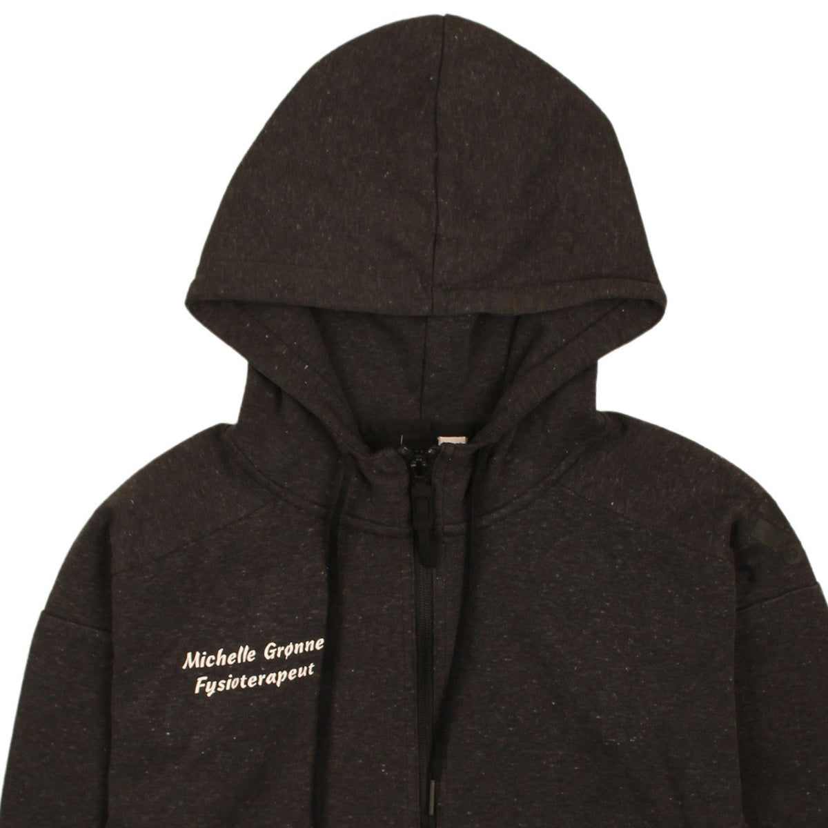 Brand and care label for Adidas women’s black full zip hoodie, size S, embroidered logo casual