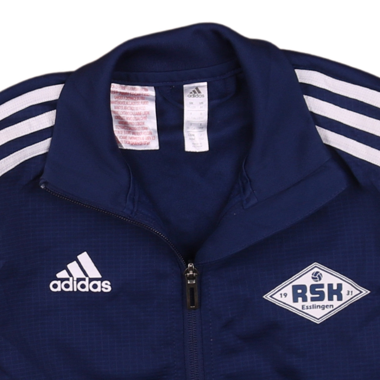 Brand and care label for Adidas boys’ blue full zip training sweatshirt 11-12 years